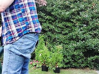 Gardener Dad Moving Plants, Then Takes A Break For A Smoke free video