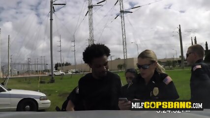 Milfs Are Taking A Black Thief Into Custody To Suck His Huge Shlong free video
